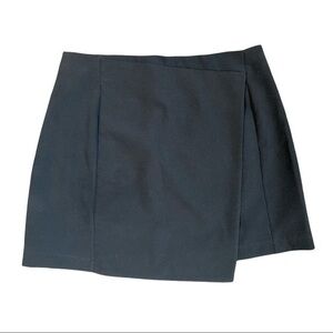 Monteau size Medium black skirt, wraps in front, waist 14.5”, length 15”